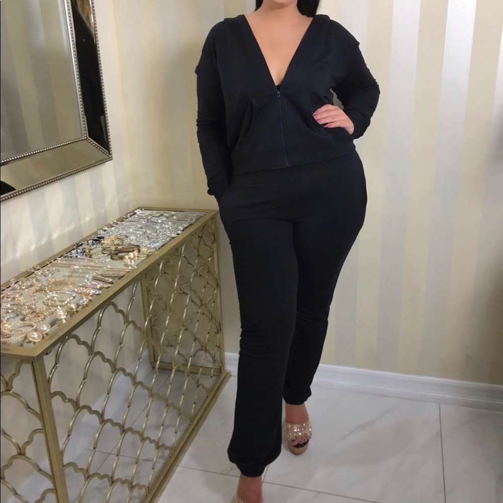 Black sweat suit jacket and pants
